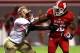 RALEIGH, NC - OCTOBER 06: Cornellius Carradine #91 of the Florida State Seminoles tackles Tony Creecy #26 of the North Carolina State Wolfpack during their game at Carter-Finley Stadium on October 6, 2012 in Raleigh, North Carolina. (Photo by Streeter Lecka/Getty Images)