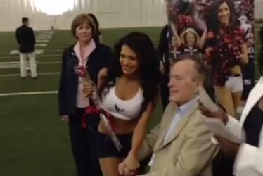 President George HW Bush Hands out Roses to HOU Cheerleaders