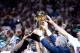 MIAMI, FL - JUNE 21: Team President Pat Riley and the Miami Heat players celebrate with the Larry O'Brien Championship trophy after they won 121-106 against the Oklahoma City Thunder in Game Five of the 2012 NBA Finals on June 21, 2012 at American Airlines Arena in Miami, Florida. NOTE TO USER: User expressly acknowledges and agrees that, by downloading and or using this photograph, User is consenting to the terms and conditions of the Getty Images License Agreement. (Photo by Ronald Martinez/Getty Images)