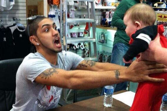 Peyton Siva: Louisville Star Trying to Eat Baby (PHOTO)