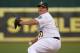 OAKLAND, CA - APRIL 12: Bartolo Colon #40 of the Oakland Athletics pitches against the Detroit Tigers in the first inning at O.co Coliseum on April 12, 2013 in Oakland, California. (Photo by Thearon W. Henderson/Getty Images)