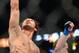 August 11, 2012; Denver, CO, USA; Benson Henderson (left) reacts after defeating Frankie Edgar (right) during UFC 150 at the Pepsi Center. Mandatory Credit: Ron Chenoy-USA TODAY Sports