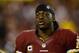 LANDOVER, MD - JANUARY 06: Robert Griffin III #10 of the Washington Redskins walks off of the field injured in the fourth quarter against the Seattle Seahawks during the NFC Wild Card Playoff Game at FedExField on January 6, 2013 in Landover, Maryland. (Photo by Patrick McDermott/Getty Images)
