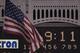 BRONX, NY - SEPTEMBER 11: On the one year anniversary of the tragic events of September 11, 2001, the American Flag flies at half-mast for a moment of silence at 9:11 p.m. during the game between the Baltimore Orioles and the New York Yankees on September 11, 2002 at Yankee Stadium in the Bronx, New York. The Yankees defeated the Orioles 5-4. (Photo by Ezra Shaw/Getty Images)