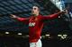 MANCHESTER, ENGLAND - FEBRUARY 10: Robin van Persie of Manchester United celebrates scoring his team's second goal during the Barclays Premier League match between Manchester United and Everton at Old Trafford on February 10, 2013 in Manchester, England. (Photo by Shaun Botterill/Getty Images)