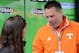 Mar 17, 2013; Bristol, TN, USA; NASCAR Sprint Cup Series driver Danica Patrick (left) speaks with Tennessee Volunteers head football coach Butch Jones before the Food City 500 at Bristol Motor Speedway. Mandatory Credit: Randy Sartin-USA TODAY Sports