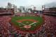 ST. LOUIS, MO - APRIL 08: General view of the St. Louis Cardinals and the Cincinnati Reds line up for the national anthem before the Opening Day on April 8, 2013 at Busch Stadium in St. Louis, Missouri. (Photo by Elsa/Getty Images)