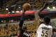 INDIANAPOLIS, IN - MAY 24: LeBron James #6 of the Miami Heat puts up a shot past Paul George #24 and over Roy Hibbert #55 of the Indiana Pacers in Game Six of the Eastern Conference Semifinals in the 2012 NBA Playoffs at Bankers Life Fieldhouse on May 24, 2012 in Indianapolis, Indiana. NOTE TO USER: User expressly acknowledges and agrees that, by downloading and/or using this photograph, User is consenting to the terms and conditions of the Getty Images License Agreement. (Photo by Jonathan Daniel/Getty Images)