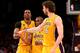 LOS ANGELES, CA - APRIL 17: Dwight Howard #12, Jodie Meeks #20, and Pau Gasol #16 of the Los Angeles Lakers celebrate as they come off the floor for a timeout during the overtime period against the Houston Rockets at Staples Center on April 17, 2013 in Los Angeles, California. The Lakers won 99-95 in overtime. NOTE TO USER: User expressly acknowledges and agrees that, by downloading and or using this photograph, User is consenting to the terms and conditions of the Getty Images License Agreement. (Photo by Stephen Dunn/Getty Images)