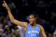 CHARLOTTE, NC - MARCH 08: Kevin Durant #35 of the Oklahoma City Thunder reacts as he goes into the game during their game against the Charlotte Bobcats at Time Warner Cable Arena on March 8, 2013 in Charlotte, North Carolina. NOTE TO USER: User expressly acknowledges and agrees that, by downloading and or using this photograph, User is consenting to the terms and conditions of the Getty Images License Agreement. (Photo by Streeter Lecka/Getty Images)