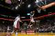 MIAMI, FL - NOVEMBER 21: LeBron James #6 of the Miami Heat shoots over Brandon Jennings #3 of the Milwaukee Bucks during a game at American Airlines Arena on November 21, 2012 in Miami, Florida. (Photo by Mike Ehrmann/Getty Images)