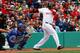 BOSTON, MA - APRIL 20: David Ortiz #34 of the Boston Red Sox singles in the fourth inning against the Kansas City Royals at Fenway Park on April 20, 2013 in Boston, Massachusetts. (Photo by Jim Rogash/Getty Images)