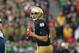 SOUTH BEND, IN - OCTOBER 20: Tommy Rees #11 of the Notre Dame Fighting Irish looks for a receiver against the BYU Cougars at Notre Dame Stadium on October 20, 2012 in South Bend, Indiana. (Photo by Jonathan Daniel/Getty Images)