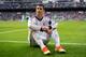 MADRID, SPAIN - APRIL 20: Cristiano Ronaldo of Real Madrid sits on the pitch during the la Liga match between Real Madrid CF and Real Betis Balompie at Estadio Santiago Bernabeu on April 20, 2013 in Madrid, Spain. (Photo by Jasper Juinen/Getty Images)