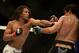 Apr 20, 2013; San Jose, CA, USA; Benson Henderson (left) fights Gilbert Melendez (right) during the lightweight championship bout of the UFC on Fuel TV at HP Pavilion. Mandatory Credit: Kyle Terada-USA TODAY Sports