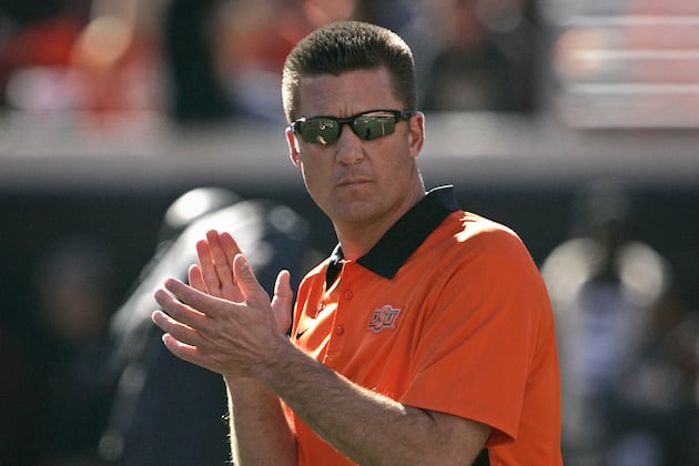 Mike Gundy Has No Plans to Reveal Starting Quarterback Any Time Soon