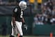 OAKLAND, CA - JANUARY 03: JaMarcus Russell #2 of the Oakland Raiders walks off the field against the Baltimore Ravens during an NFL game at Oakland-Alameda County Coliseum on January 3, 2010 in Oakland, California. (Photo by Jed Jacobsohn/Getty Images)