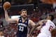 LOS ANGELES, CA - APRIL 20: Marc Gasol #33 of the Memphis Grizzlies scores on his shot as he is fouled by DeAndre Jordan #6 of the Los Angeles Clippers during Game One of the Western Conference Quarterfinals of the 2013 NBA Playoffs at Staples Center on April 20, 2013 in Los Angeles, California. NOTE TO USER: User expressly acknowledges and agrees that, by downloading and or using this photograph, User is consenting to the terms and conditions of the Getty Images License Agreement. (Photo by Harry How/Getty Images)