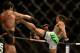 Apr 20, 2013; San Jose, CA, USA; Benson Henderson (right) fights Gilbert Melendez (left) during the lightweight championship bout of the UFC on Fuel TV at HP Pavilion. Mandatory Credit: Kyle Terada-USA TODAY Sports