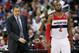 WASHINGTON, DC - APRIL 02: Head coach Randy Wittman of the Washington Wizards and John Wall #2 watch from the bench during the first half against the Chicago Bulls at Verizon Center on April 2, 2013 in Washington, DC. NOTE TO USER: User expressly acknowledges and agrees that, by downloading and or using this photograph, User is consenting to the terms and conditions of the Getty Images License Agreement. (Photo by Rob Carr/Getty Images)