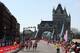 LONDON, UNITED KINGDOM - APRIL 21: Competitors emerge from Tower Bridge during the Virgin London Marathon on April 21, 2013 in LONDON, ENGLAND. (Photo by Stephen Pond/Getty Images)