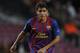 BARCELONA, SPAIN - DECEMBER 06: Jonathan dos Santos of FC Barcelona runs with the ball during the UEFA Champions League group H match between FC Barcelona and FC BATE Borisov at Camp Nou on December 6, 2011 in Barcelona, Spain. FC Barcelona won 4-0. (Photo by David Ramos/Getty Images)