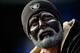 CHARLOTTE, NC - DECEMBER 23: A member of Raider Nation watches the game between the Carolina Panthers and the Oakland Raiders during play at Bank of America Stadium on December 23, 2012 in Charlotte, North Carolina. (Photo by Grant Halverson/Getty Images)