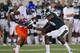 EAST LANSING, MI - AUGUST 31: Jamar Taylor #5 of the Boise State Broncos intercepts a first-quarter pass against Tony Lippett #14 of the Michigan State Spartans at Spartan Stadium on August, 2010 in East Lansing, Michigan. (Photo by Gregory Shamus/Getty Images)