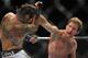 Jun 22, 2012; Atlantic City, NJ, USA; Clay Guida (left) fights Gray Maynard in a lightweight bout during UFC on FX at Revel Resort and Casino. Gray Maynard won the fight by split decision in the fifth round. Mandatory Credit: Joe Camporeale-USA TODAY Sports
