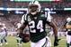 Sept 11, 2011; East Rutherford, NJ, USA; New York Jets cornerback Darrelle Revis (24) celebrates his interception during the second half against the Dallas Cowboys at the MetLife Stadium. The Jets defeated the Cowboys 27-24. Mandatory Credit: Ed Mulholland-USA TODAY Sports