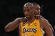 LOS ANGELES, CA - APRIL 12: Kobe Bryant #24 of the Los Angeles Lakers is consoled by Metta World Peace #15 of the Los Angeles Lakers after injuring himself against the Golden State Warriors in the second half at Staples Center on April 12, 2013 in Los Angeles, California. The Lakers defeated the Warriors 118-116. NOTE TO USER: User expressly acknowledges and agrees that, by downloading and or using this photograph, User is consenting to the terms and conditions of the Getty Images License Agreement. (Photo by Jeff Gross/Getty Images)