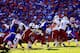 GAINESVILLE, FL - OCTOBER 20: Running back Marcus Lattimore #21 of the South Carolina Gamecocks rushes against the Florida Gators at Ben Hill Griffin Stadium on October 20, 2012 in Gainesville, Florida. (Photo by Chris Trotman/Getty Images)