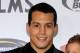 LAS VEGAS, NV - NOVEMBER 30: (C) Mixed martial artist Vinny Magalhaes, wife Alliny Magalhaes and son Vitor Magalhaes arrive at the Fighters Only World Mixed Martial Arts Awards 2011 at the Palms Casino Resort November 30, 2011 in Las Vegas, Nevada. (Photo by Ethan Miller/Getty Images)