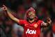 MANCHESTER, ENGLAND - APRIL 22: Patrice Evra of Manchester United celebrates victory and winning the Premier League title after the Barclays Premier League match between Manchester United and Aston Villa at Old Trafford on April 22, 2013 in Manchester, England. (Photo by Alex Livesey/Getty Images)