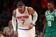 NEW YORK, NY - APRIL 20: Carmelo Anthony #7 of the New York Knicks celebrates a three point basket in the second half as Jeff Green #8 of the Boston Celtics looks on during Game One of the Eastern Conference Quarterfinals of the 2013 NBA Playoffs on April 20, 2013 at Madison Square Garden in New York City. The New York Knicks defeated the Boston Celtics 85-78. NOTE TO USER: User expressly acknowledges and agrees that, by downloading and/or using this photograph, user is consenting to the terms and conditions of the Getty Images License Agreement. (Photo by Elsa/Getty Images)