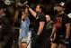 Apr 20, 2013; San Jose, CA, USA; Benson Henderson (left) celebrates after defeating Gilbert Melendez (right) during the lightweight championship bout of the UFC on Fuel TV at HP Pavilion. Mandatory Credit: Kyle Terada-USA TODAY Sports