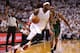 MIAMI, FL - APRIL 21: LeBron James #6 of the Miami Heat drives past Luc Richard Mbah a Moute #12 of the Milwaukee Bucks during Game 1 of the Eastern Conference Quarterfinals of the 2013 NBA Playoffs at American Airlines Arena on April 21, 2013 in Miami, Florida. NOTE TO USER: User expressly acknowledges and agrees that, by downloading and or using this photograph, User is consenting to the terms and conditions of the Getty Images License Agreement. (Photo by Mike Ehrmann/Getty Images)