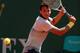 MONTE-CARLO, MONACO - APRIL 16: Grigor Dimitrov of Bulgaria runs to play a backhand against Janko Tipsarevic of Serbia in their second round match during day three of the ATP Monte Carlo Masters,at Monte-Carlo Sporting Club on April 16, 2013 in Monte-Carlo, Monaco. (Photo by Clive Brunskill/Getty Images)