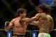 Apr 20, 2013; San Jose, CA, USA; Benson Henderson (left) fights Gilbert Melendez (right) during the lightweight championship bout of the UFC on Fuel TV at HP Pavilion. Mandatory Credit: Kyle Terada-USA TODAY Sports