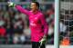 SWANSEA, WALES - JANUARY 06: Wojciech Szczesny of Arsenal signals during the FA Cup with Budweiser Third Round match between Swansea City and Arsenal at Liberty Stadium on January 6, 2013 in Swansea, Wales. (Photo by Stu Forster/Getty Images)