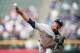 DENVER, CO - APRIL 7: Edinson Volquez #37 of the San Diego Padres pitches against the Colorado Rockies in the first inning of a game at Coors Field on April 7, 2013 in Denver, Colorado. (Photo by Dustin Bradford/Getty Images)