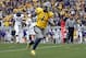 MORGANTOWN, WV - NOVEMBER 03: Tavon Austin #1 of the West Virginia Mountaineers catches a forty three yard touchdown pass against the TCU Horned Frogs during the game on November 3, 2012 at Mountaineer Field in Morgantown, West Virginia. (Photo by Justin K. Aller/Getty Images)