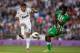 MADRID, SPAIN - APRIL 20: Casemiro (L) of Real Madrid CF competes for the ball with Nosa Iglebor (R) during the La Liga match between Real Madrid CF and Real Betis Balompie at Santiago Bernabeu Stadium on April 20, 2013 in Madrid, Spain. (Photo by Gonzalo Arroyo Moreno/Getty Images)