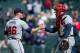 DENVER, CO - APRIL 23: Craig Kimbrel #46 and Evan Gattis #24 of the Atlanta Braves celebrate after the final out of the game against the Colorado Rockies at Coors Field on April 23, 2013 in Denver, Colorado. The Braves defeated the Rockies 4-3 in the first game of a doubleheader. (Photo by Justin Edmonds/Getty Images)