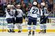 BUFFALO, NY - APRIL 22: Aaron Gagnon #21 of the Winnipeg Jets celebrates his second period goal against the Buffalo Sabres with teammates Antti Miettinen #20, Derek Meech #7, Chris Thorburn #22 and Dustin Byfuglien #33 at First Niagara Center on April 22, 2013 in Buffalo, New York. (Photo by Sean Rudyk/Getty Images)