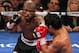 LAS VEGAS, NV - JUNE 09: (L-R) Timothy Bradley lands a left to the head of Manny Pacquiao during their WBO welterweight title fight at MGM Grand Garden Arena on June 9, 2012 in Las Vegas, Nevada. (Photo by Jeff Bottari/Getty Images)