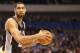 DALLAS, TX - DECEMBER 30: Tim Duncan #21 of the San Antonio Spurs at American Airlines Center on December 30, 2012 in Dallas, Texas. NOTE TO USER: User expressly acknowledges and agrees that, by downloading and or using this photograph, User is consenting to the terms and conditions of the Getty Images License Agreement. (Photo by Ronald Martinez/Getty Images)