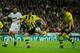 MADRID, SPAIN - NOVEMBER 06: Robert Lewandowski (C) of Borussia Dortmund fires on goal in between Xabi Alonso (L) of Real Madrid and his teammate Kevin Grosskreutz during the UEFA Champions League group D match between Real Madrid and Borussia Dortmund at Estadio Santiago Bernabeu on November 6, 2012 in Madrid, Spain. (Photo by Jasper Juinen/Getty Images)