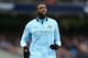 MANCHESTER, ENGLAND - DECEMBER 09: Kolo Toure of Manchester City loks on during the Barclays Premier League match between Manchester City and Manchester United at the Etihad Stadium on December 9, 2012 in Manchester, England. (Photo by Clive Mason/Getty Images)