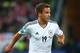 GDANSK, POLAND - JUNE 22: Mario Gotze of Germany runs with the ball during the UEFA EURO 2012 quarter final match between Germany and Greece at The Municipal Stadium on June 22, 2012 in Gdansk, Poland. (Photo by Alex Grimm/Getty Images)